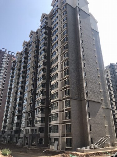 陜煤建設銅煤公司第十二項目部承建的紫藤園小區9#樓等順利通過竣工驗收