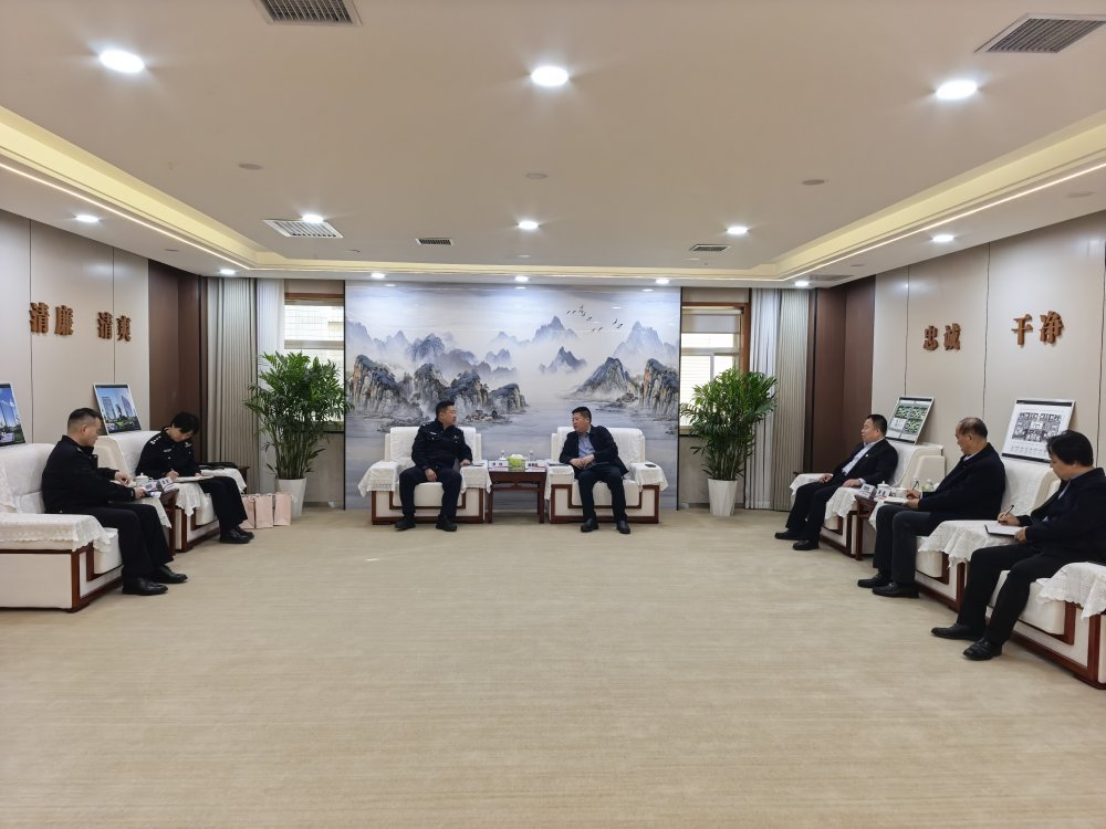 西安市公安局經開分局與陜煤建設集團座談交流